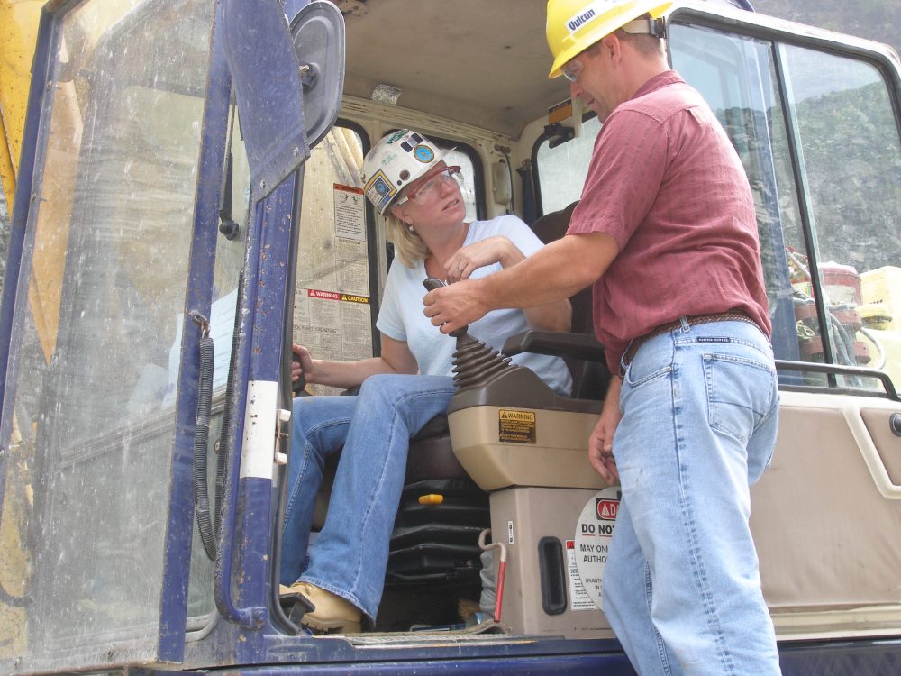 Workers discussing job site safety
